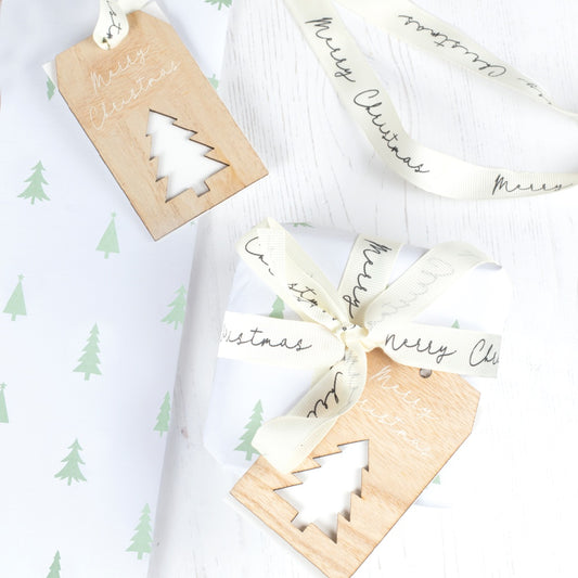 Christmas Wrapping Paper With Ribbon and Wooden Tag